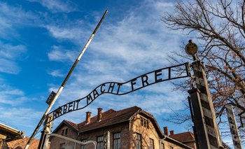 The historic 'Arbeit Macht Frei' gate at Auschwitz I concentration camp in Poland – visitor guide from Kraków.